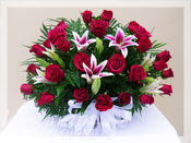 Regal Red Roses Funeral Arrangement